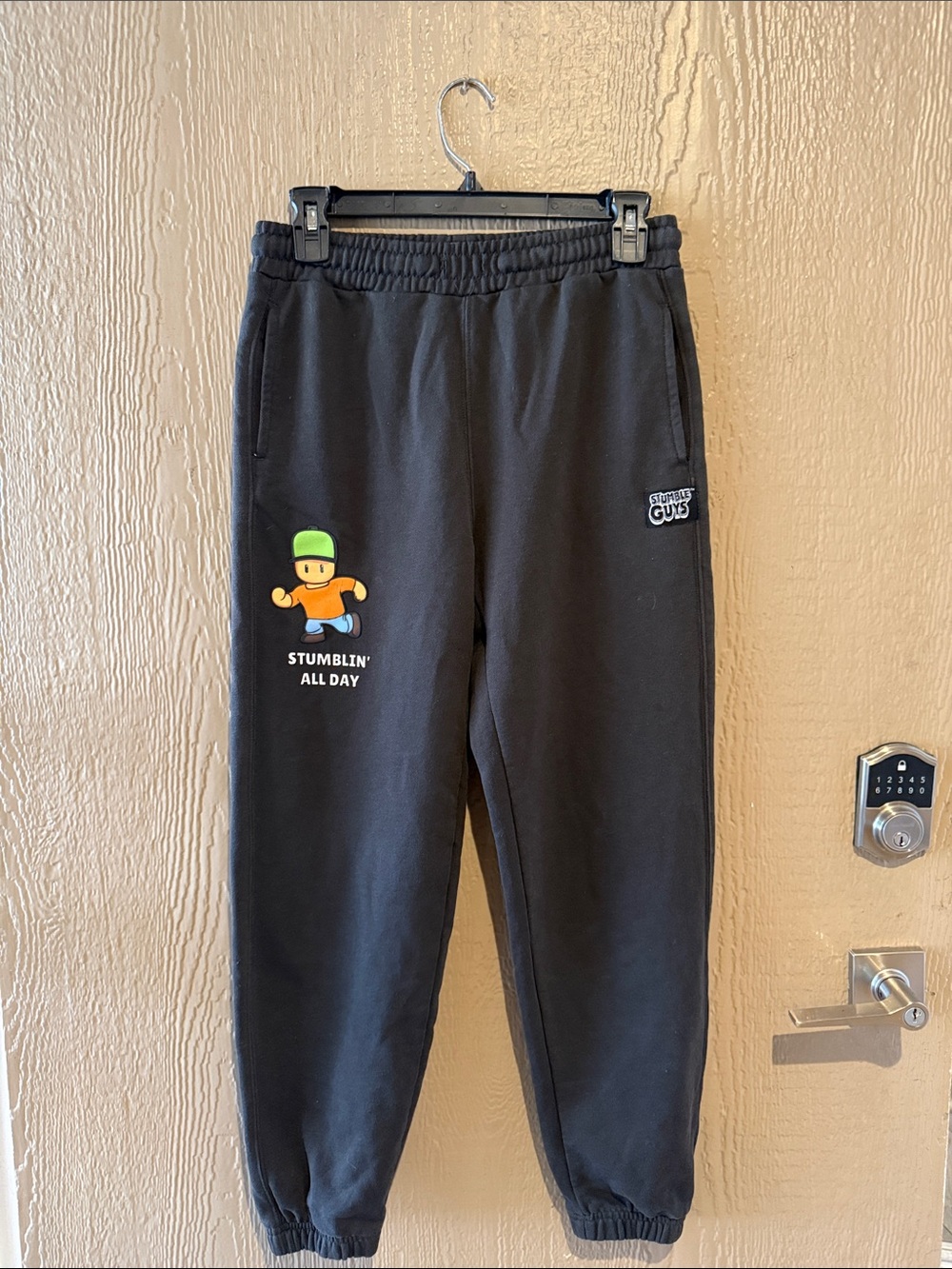 Zara Black Sweatpants with Green & Orange Character Graphic